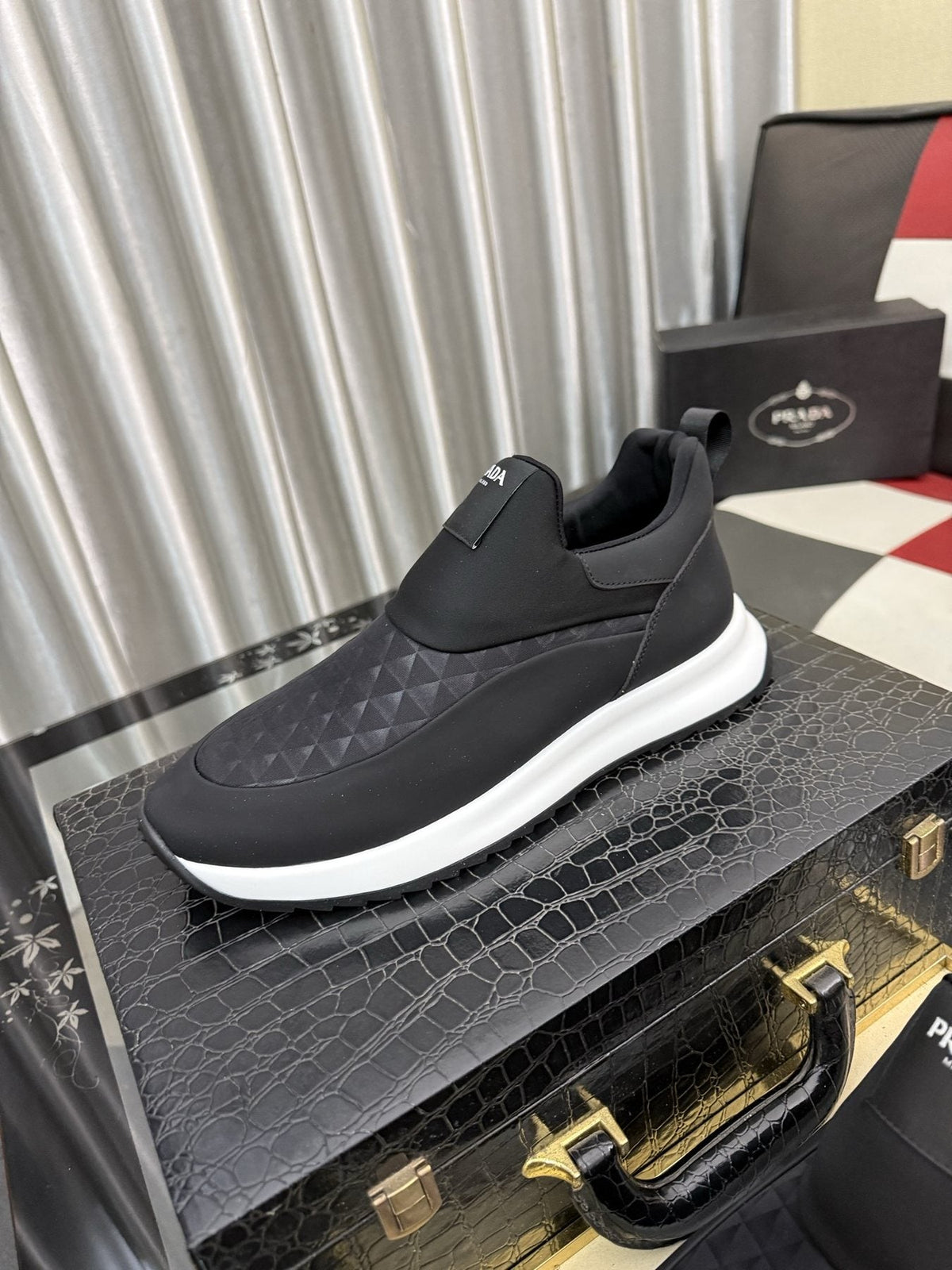 Prada Black Quilted Slip-On Sneakers